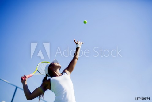 Picture of Beautiful female tennis player serving